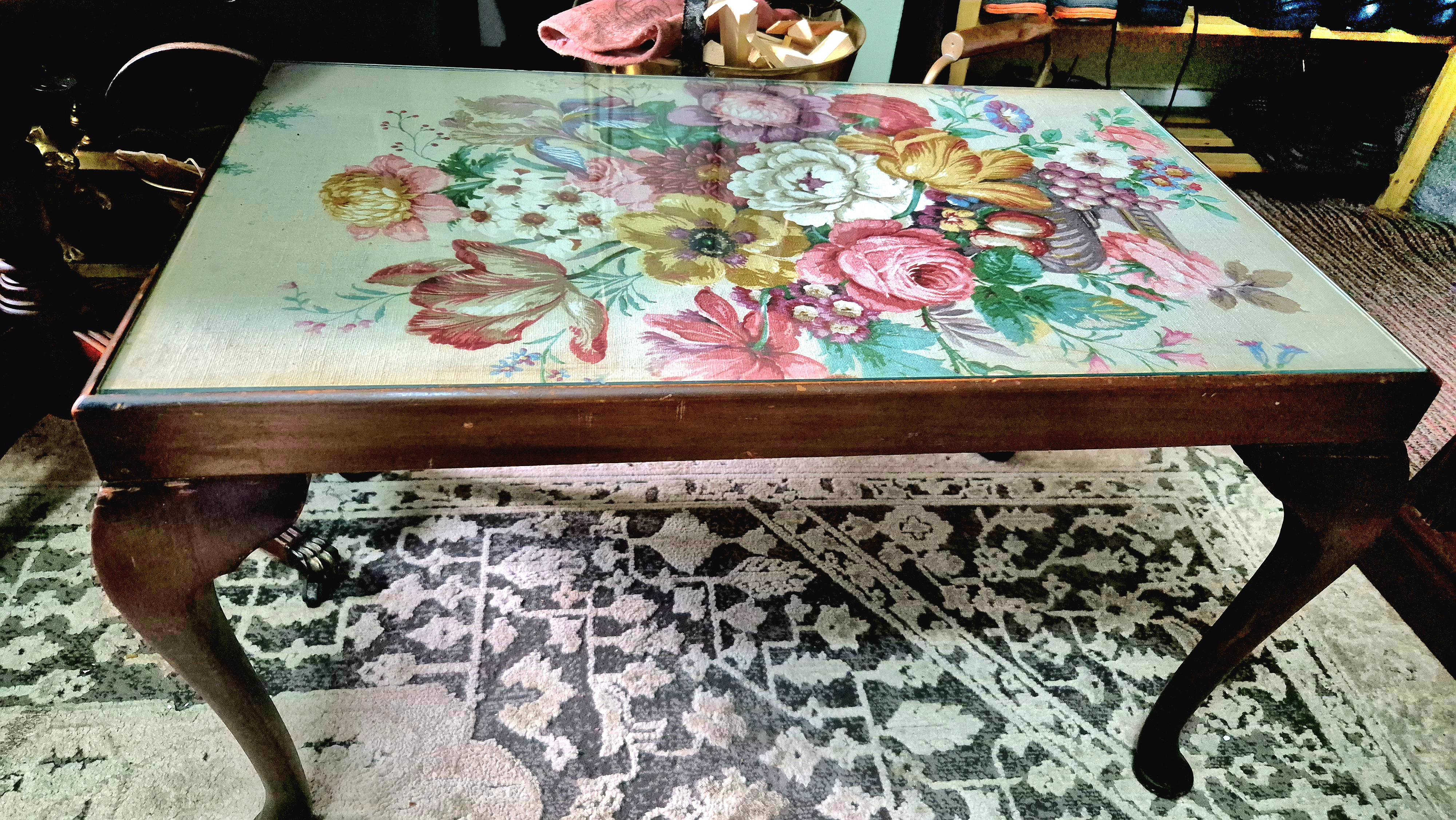 Solid wood, glass top embroidery/printed top on queen Anne l