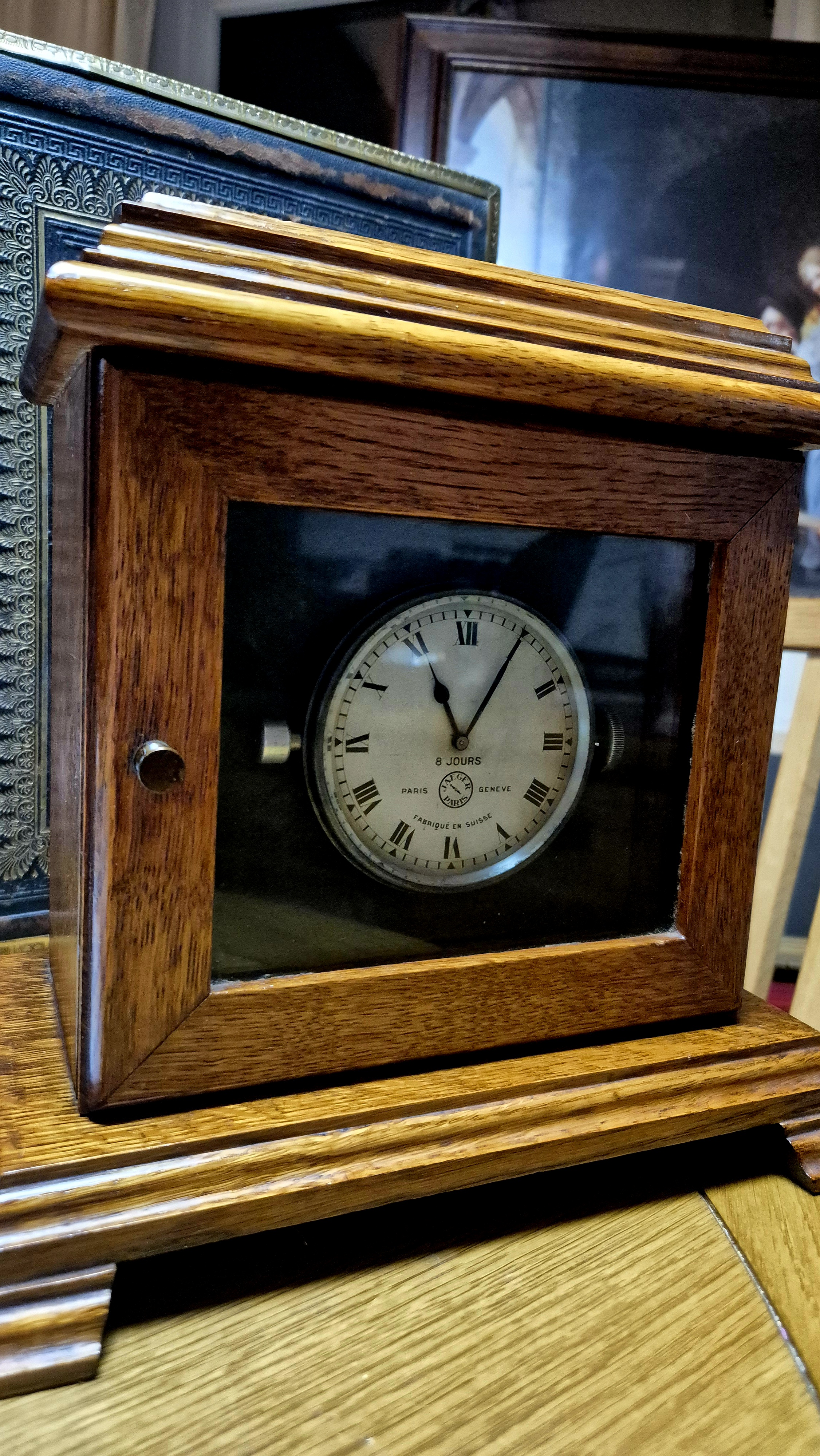 Original Jaeger antique watch, mounted on a solid oak cabine