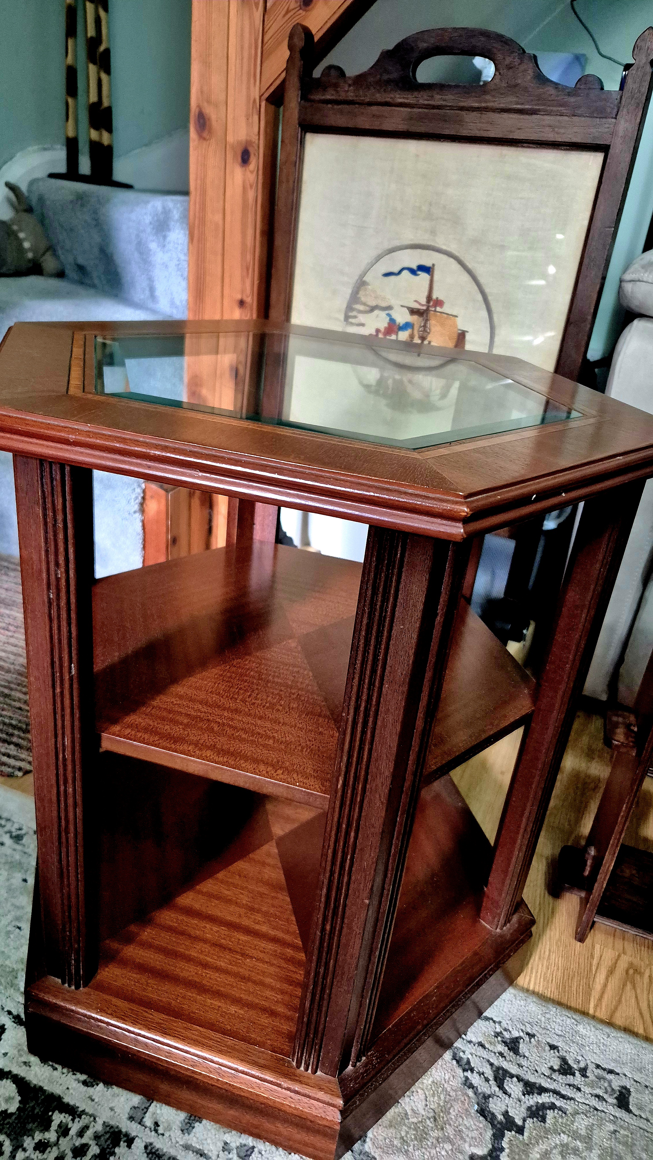 Hexagonal display table with glass top