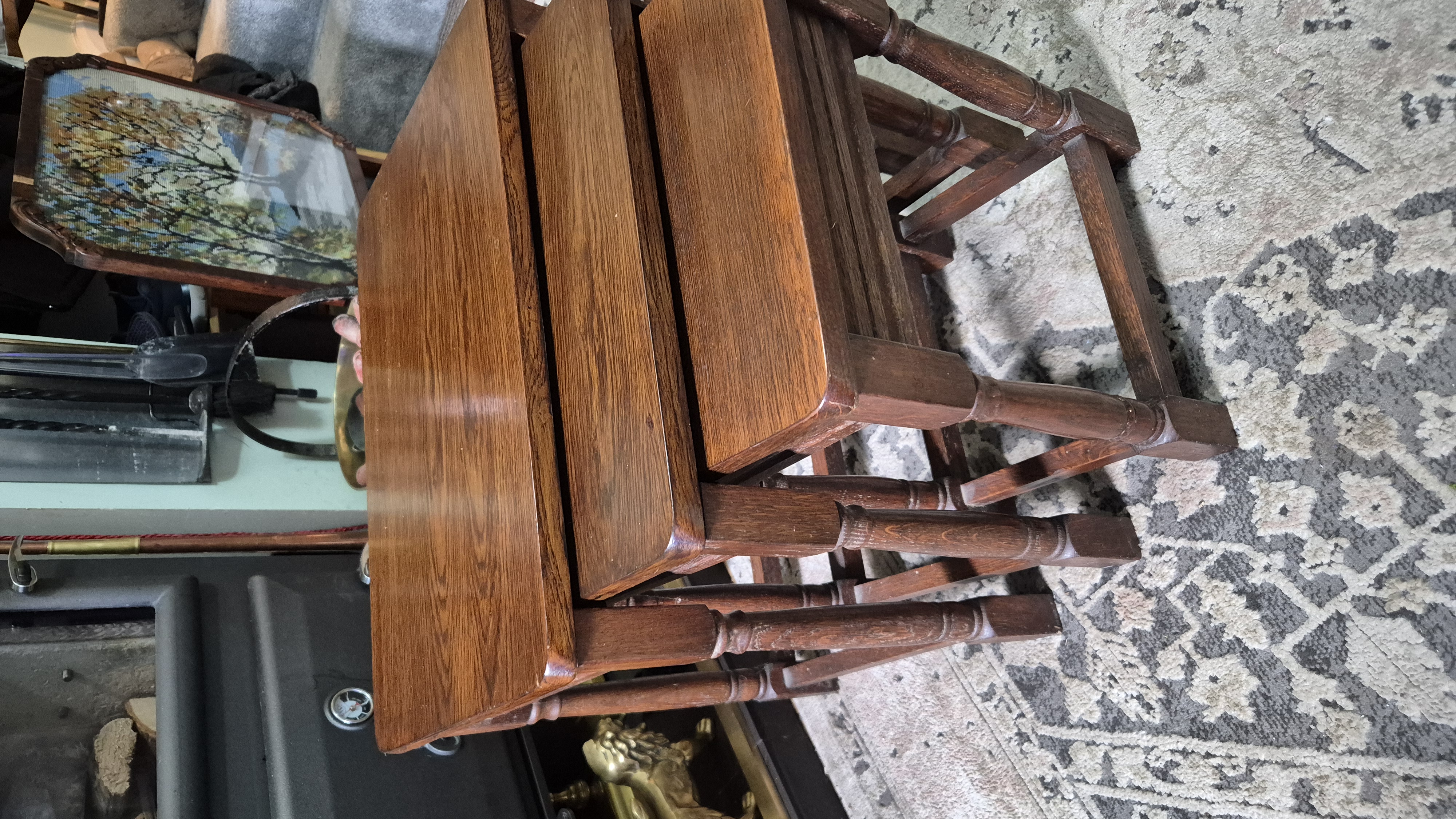 Nest of 3 vintage solid oak tables in great condition with a
