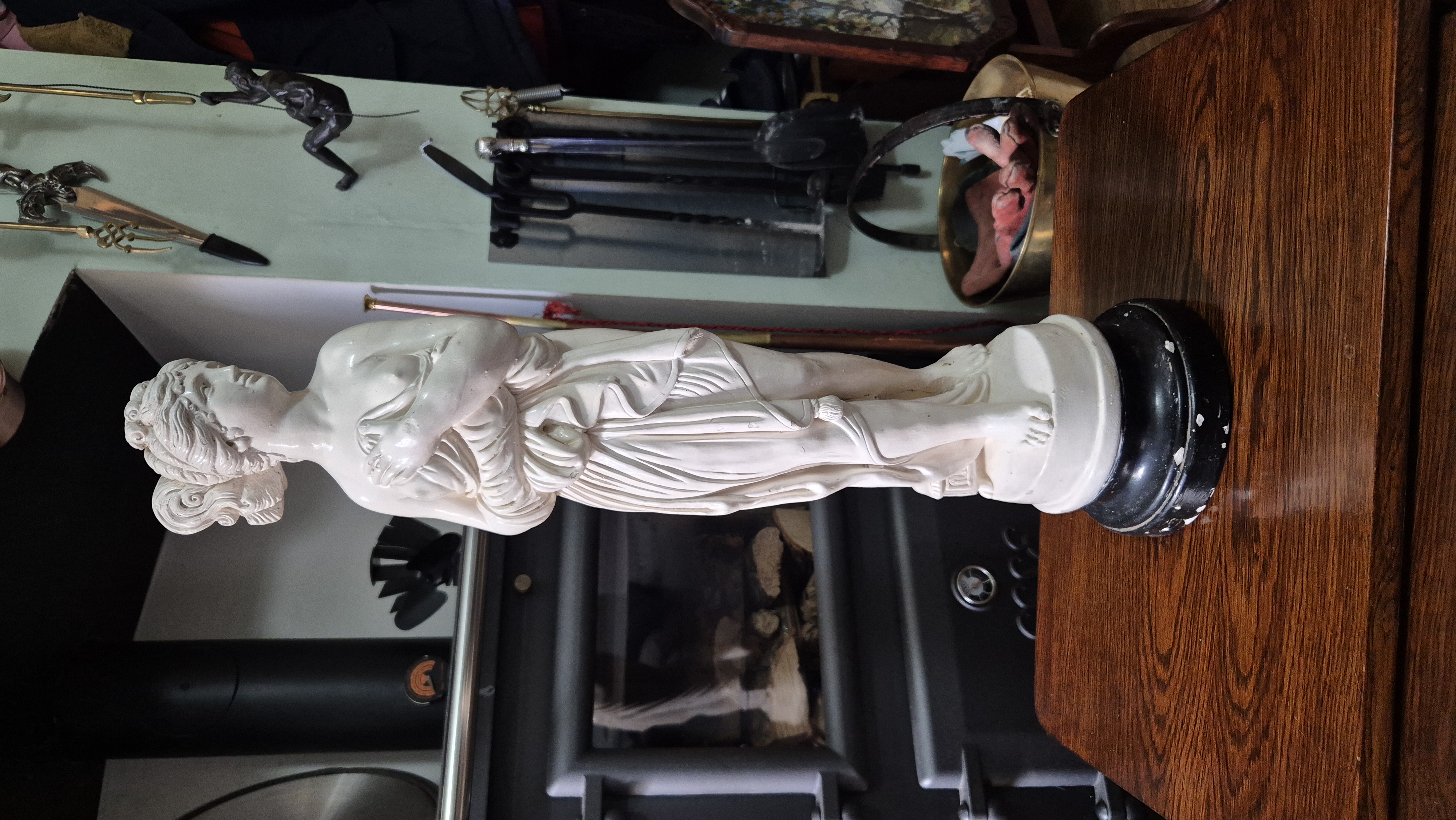 antique stature of Greek lady on plinth. This item may have 