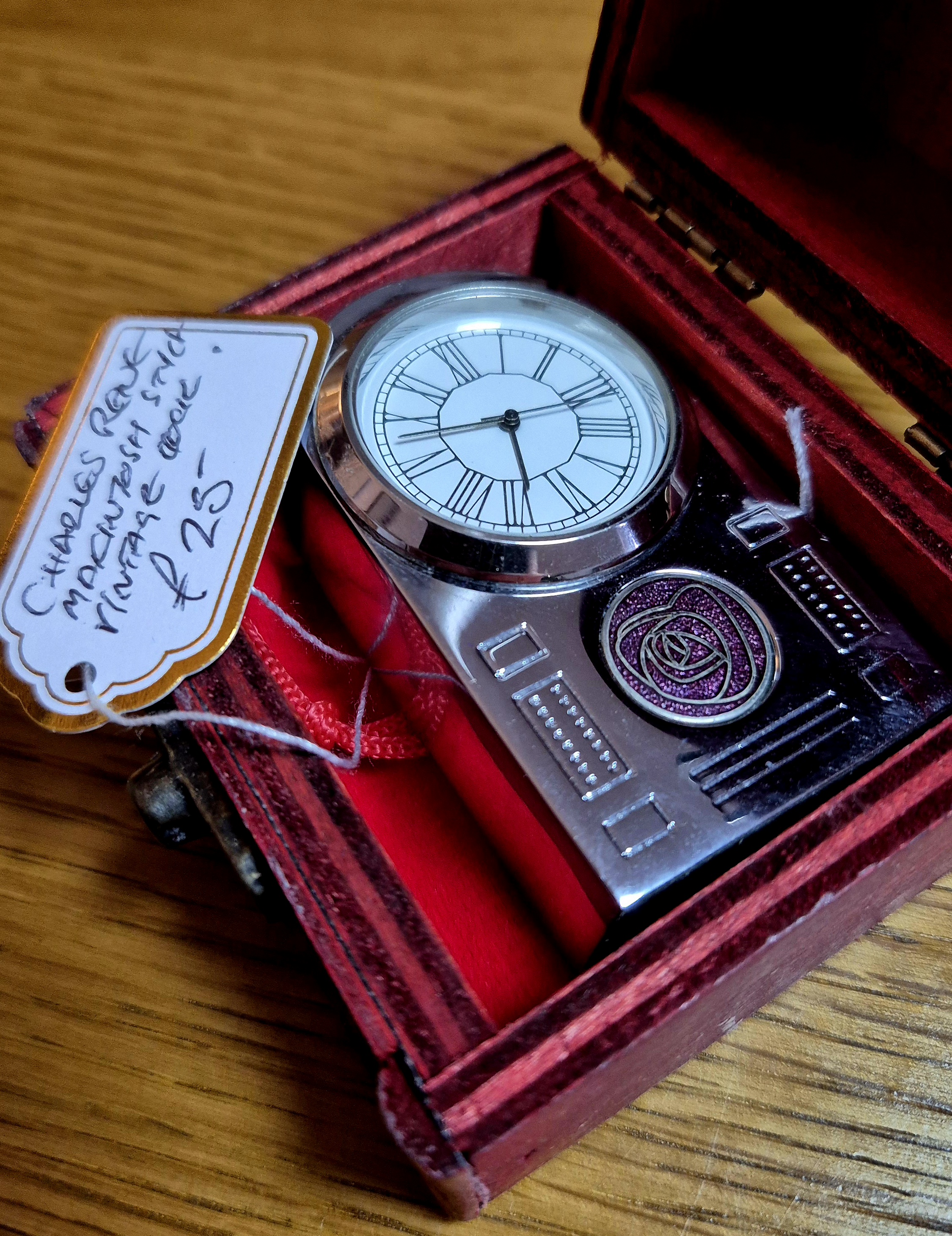 Small bedside clock in the style of Charles Rene Macintosh, 
