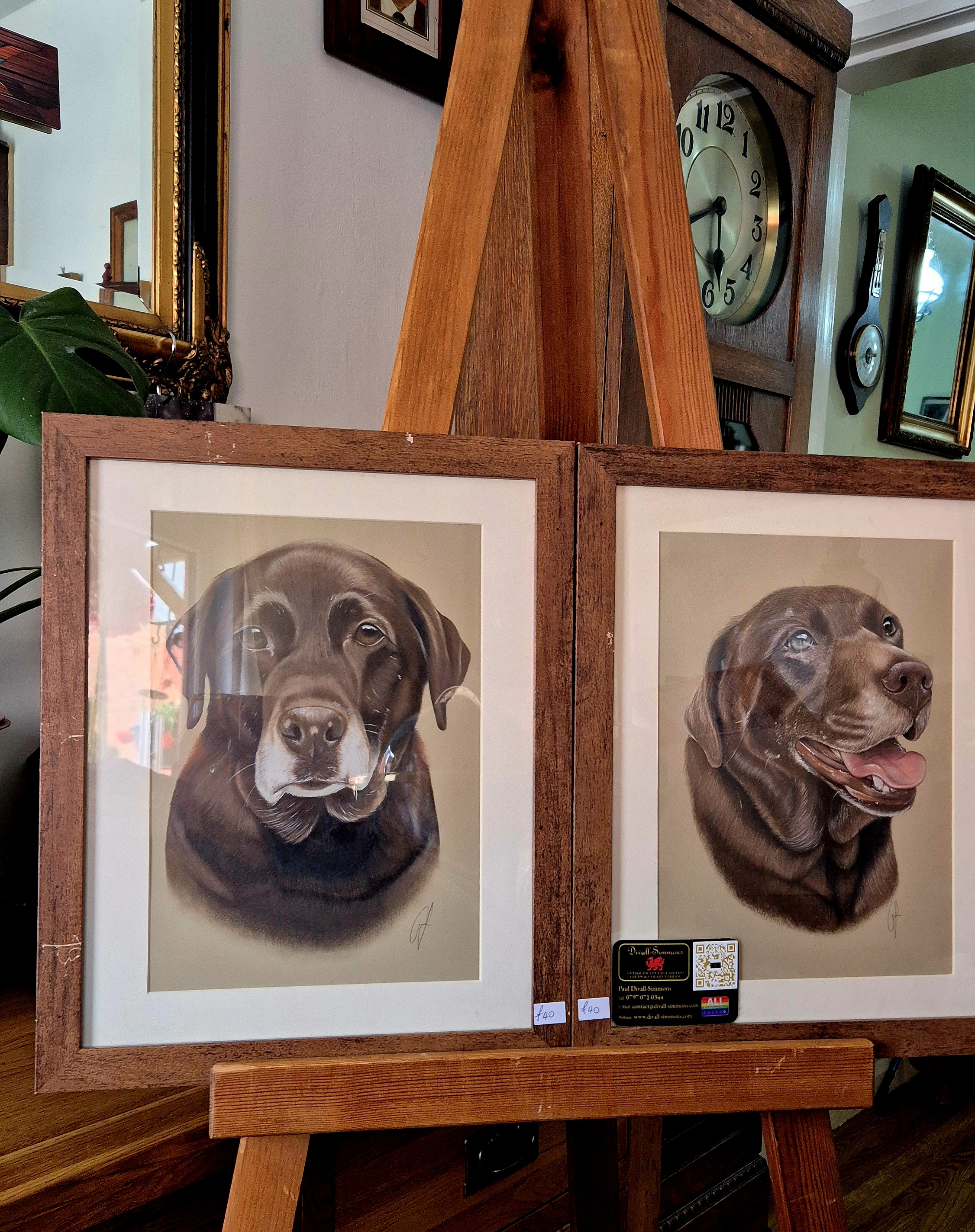 A Pair of framed and glazed original portraits of a chocolat