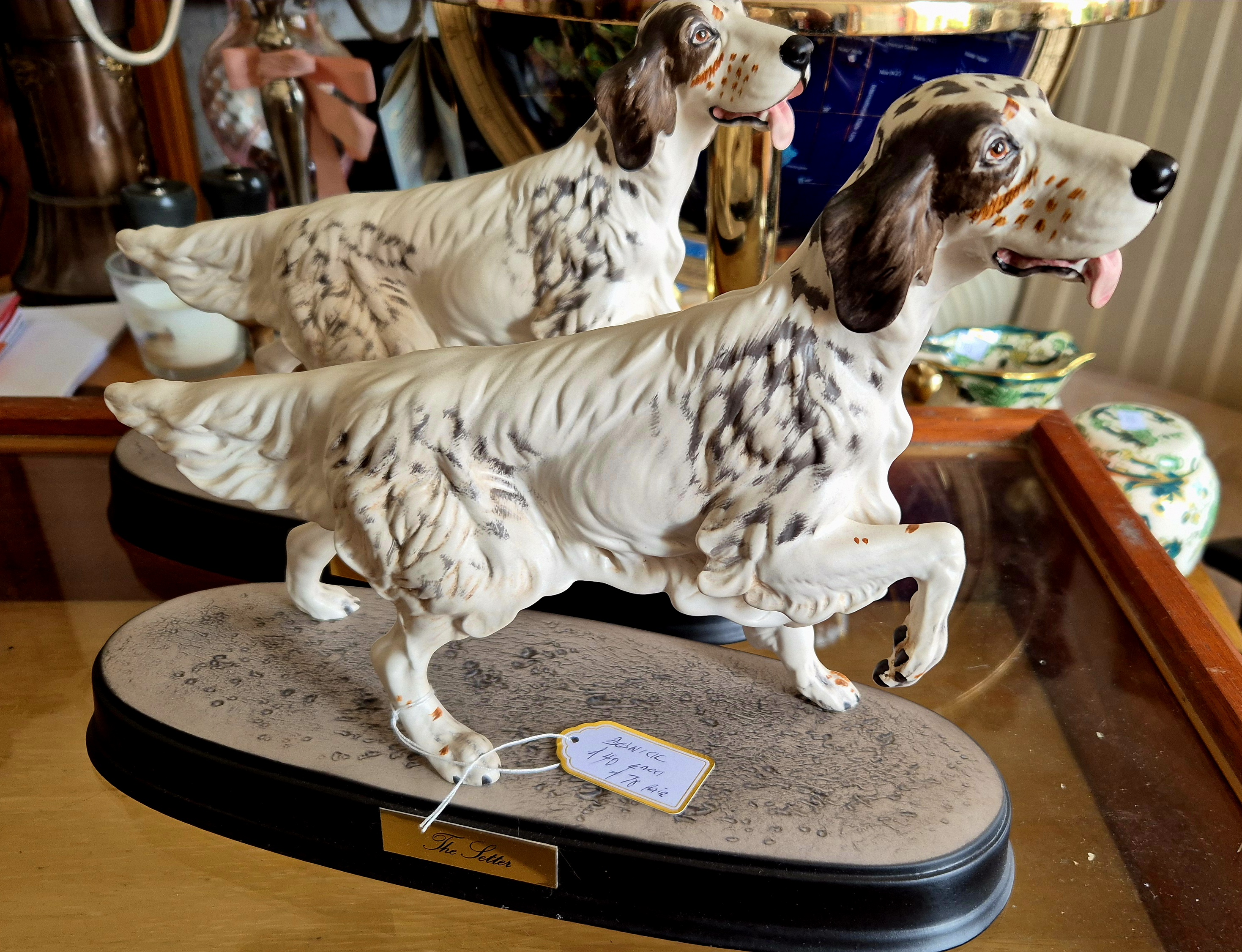 A Pair of Beswick ceramic dogs on plinth 'The setter'