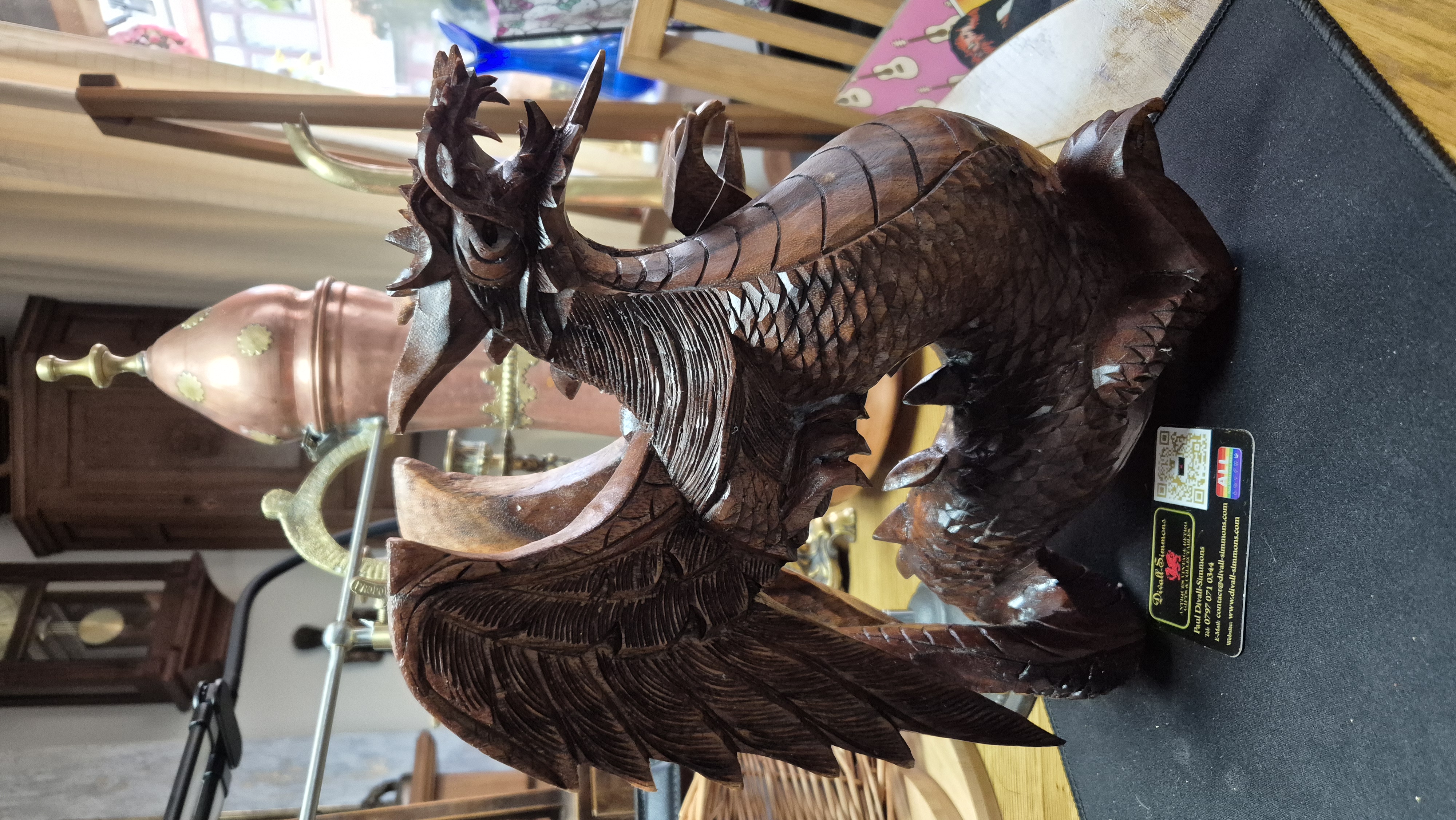 Large Studio carving of a dragon, made from one piece of woo
