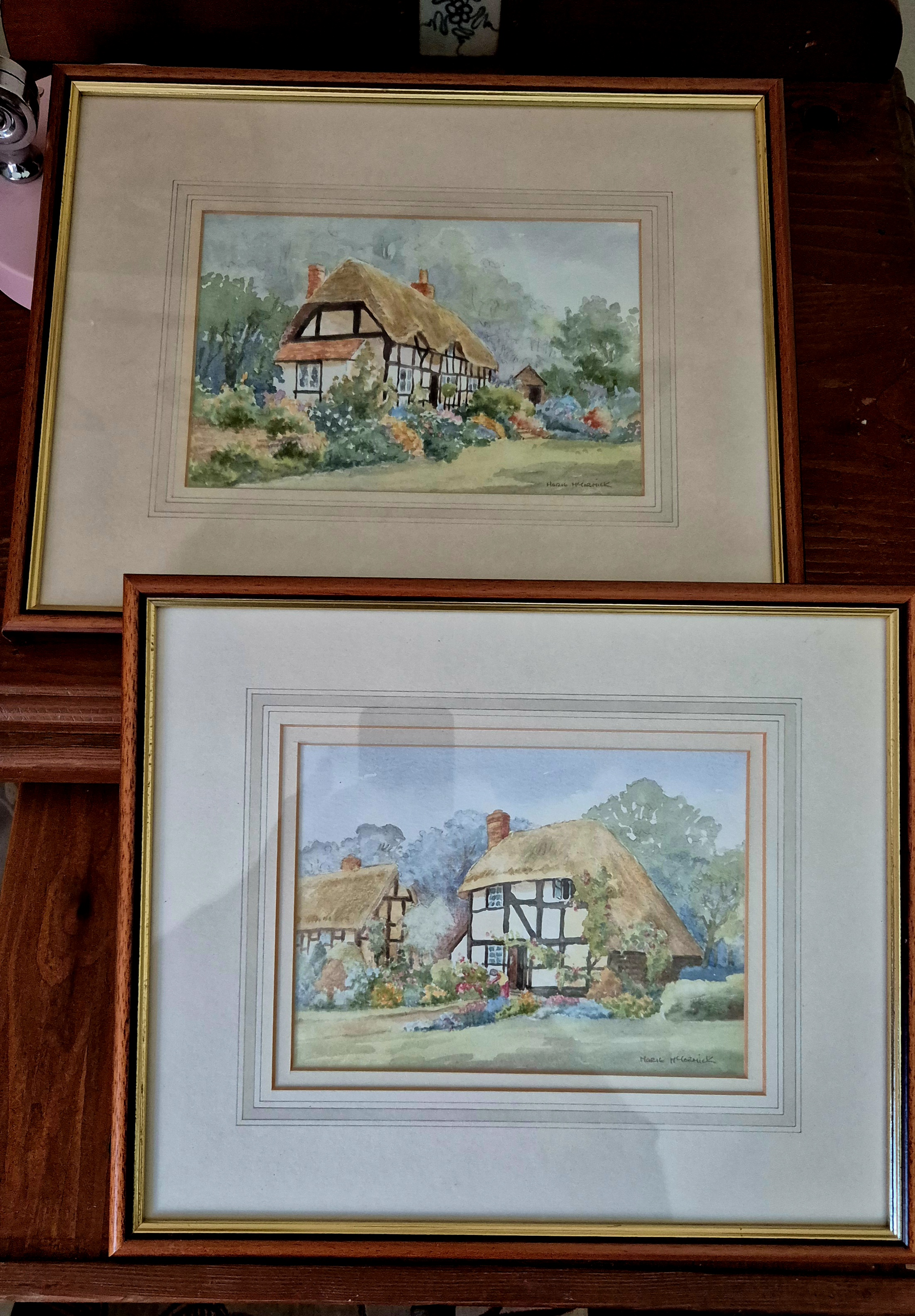 A pair of original watercolours by Helen McCormick depicting